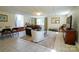 Spacious living room with a sofa, chair, and tile floors, with natural light from a window at 1081 Deas St, Rock Hill, SC 29732