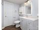 Bathroom boasts modern vanity with ample storage, a decorative mirror, and neutral color scheme at 1119 Highway 218 W Hwy, Indian Trail, NC 28079
