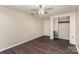 Bright bedroom with closet spaces and three doorways, leading to other rooms at 1119 Highway 218 W Hwy, Indian Trail, NC 28079