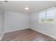 This bedroom with neutral walls offers a serene retreat with natural light at 1119 Highway 218 W Hwy, Indian Trail, NC 28079