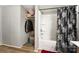 Functional bathroom with a shower-tub combo and storage shelves at 114 Oakland Rd, Belmont, NC 28012