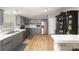 Modern kitchen featuring stainless steel appliances, gray cabinets, and plenty of counter space at 114 Oakland Rd, Belmont, NC 28012