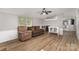 Inviting living room with natural light, plush seating, and wood-look flooring at 114 Oakland Rd, Belmont, NC 28012