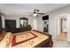 Well-lit bedroom with dark-toned furnishings and space for storage at 114 Oakland Rd, Belmont, NC 28012