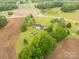Idyllic countryside home with ample land, outbuildings, and beautiful mature trees at 1162 E Doc Garris Rd, Lancaster, SC 29720