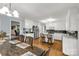 Eat-in kitchen features white cabinets, stainless appliances, and an island with seating at 1162 E Doc Garris Rd, Lancaster, SC 29720