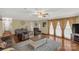 Bright living room featuring hardwood floors, neutral paint, and lots of natural light at 1162 E Doc Garris Rd, Lancaster, SC 29720