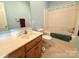 Well-lit bathroom with a single sink vanity and a shower-tub combination at 123 Cross Creek Dr, Statesville, NC 28625