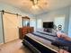 Inviting bedroom with a ceiling fan, dresser with a mirror, and comfortable bed for a relaxing sleep at 123 Cross Creek Dr, Statesville, NC 28625