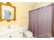 Cozy bathroom with classic vanity mirror and shower at 1233 Weymouth Ln, Charlotte, NC 28270