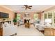 Inviting living room with fireplace, hardwood floors, and generous natural light at 1233 Weymouth Ln, Charlotte, NC 28270