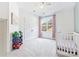 Bright bedroom with white walls, carpet, and playful decor at 14220 Stewarts Bend Ln, Charlotte, NC 28277