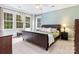 Spacious main bedroom with large windows, providing ample natural light at 14220 Stewarts Bend Ln, Charlotte, NC 28277
