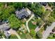 Aerial shot showcasing a well-manicured property with lush gardens and a long driveway, creating an inviting approach at 17040 Jetton Rd, Cornelius, NC 28031