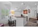 Stylish bar area with seating, sleek countertops, and ample lighting at 17040 Jetton Rd, Cornelius, NC 28031