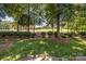 Picturesque backyard featuring a manicured lawn with views of the beautiful golf course at 17040 Jetton Rd, Cornelius, NC 28031