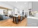 Open kitchen with a large island, seating, and seamless flow to other living spaces at 17040 Jetton Rd, Cornelius, NC 28031