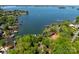 Expansive lake view showcasing waterfront properties with private docks and boat access, ideal for lakeside living at 17040 Jetton Rd, Cornelius, NC 28031