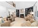 Spacious living room featuring a fireplace, high ceiling, and open floor plan at 17040 Jetton Rd, Cornelius, NC 28031