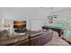 Spacious living room with large TV, comfortable seating, and a pool table at 17040 Jetton Rd, Cornelius, NC 28031