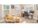 Bright home office with neutral walls, plush carpets, and a dedicated workspace at 1713 Mt Isle Harbor Dr, Charlotte, NC 28214