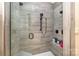 Luxurious tiled shower with dual shower heads and glass enclosure at 1713 Mt Isle Harbor Dr, Charlotte, NC 28214