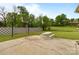 A patio with swing set and picnic table and a large manicured back yard at 182 Ryan St, Salisbury, NC 28144