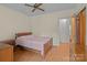 Bedroom with wood floors, pastel walls, and wood furniture at 182 Ryan St, Salisbury, NC 28144