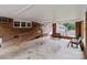Spacious covered patio with brick pillars and a wooden ramp entrance at 182 Ryan St, Salisbury, NC 28144