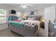Bright bedroom with a large window, tufted headboard bed, and modern decor at 230 Castle Keep Rd, Salisbury, NC 28146