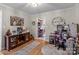 Cozy office area with desk, chair, and decorations, located near the kitchen for convenience at 230 Castle Keep Rd, Salisbury, NC 28146