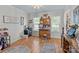 Bright office with a built in hutch, wood floors, and large windows at 230 Castle Keep Rd, Salisbury, NC 28146