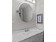 Clean bathroom featuring a single sink, modern fixtures, and a framed picture providing a functional and aesthetically pleasing space at 1300 Larchmont Pl # 306, Salisbury, NC 28144