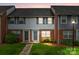 Charming brick townhome features a well-manicured lawn and inviting entrance at 1300 Larchmont Pl # 306, Salisbury, NC 28144