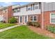 Charming brick townhome features a well-manicured lawn and inviting entrance at 1300 Larchmont Pl # 306, Salisbury, NC 28144