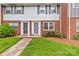 Charming brick townhome features a well-manicured lawn and inviting entrance at 1300 Larchmont Pl # 306, Salisbury, NC 28144