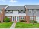 Charming brick townhome features a well-manicured lawn and inviting entrance at 1300 Larchmont Pl # 306, Salisbury, NC 28144