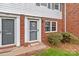 Charming brick townhome features a well-manicured lawn and inviting entrance at 1300 Larchmont Pl # 306, Salisbury, NC 28144