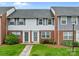 Charming brick townhome features a well-manicured lawn and inviting entrance at 1300 Larchmont Pl # 306, Salisbury, NC 28144