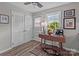 Bright kitchen featuring natural light, white cabinets, and a functional layout creating a welcoming cooking environment at 1300 Larchmont Pl # 306, Salisbury, NC 28144