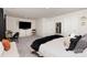 Spacious primary bedroom with decorative touches, a large tv, and a sitting area at 330 Hyssop Ct, Fort Mill, SC 29715