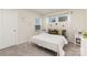 This charming bedroom offers neutral walls, carpet, and bright windows allowing natural light to illuminate the space at 330 Hyssop Ct, Fort Mill, SC 29715