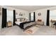 Primary bedroom with neutral tones, ample natural light, and trendy decor at 330 Hyssop Ct, Fort Mill, SC 29715