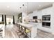 Stylish kitchen showcasing white cabinets, a large island with seating, stainless steel appliances, and an open layout at 330 Hyssop Ct, Fort Mill, SC 29715