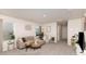 Bright and airy living room showcasing modern decor, neutral tones, and lots of seating at 330 Hyssop Ct, Fort Mill, SC 29715