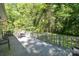 Outdoor deck with railing offers a serene space for relaxation and entertaining at 3332 Celanese Rd, Rock Hill, SC 29732