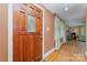Welcoming foyer featuring hardwood floors, a decorative glass paneled front door and bright sunlight at 3332 Celanese Rd, Rock Hill, SC 29732
