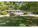 Well maintained light blue ranch home with mature landscaping and a large shaded front yard at 3332 Celanese Rd, Rock Hill, SC 29732