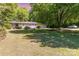 Charming single-story home with a well-maintained front yard and mature shade trees at 3332 Celanese Rd, Rock Hill, SC 29732