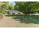 Charming single-story home with a well-maintained front yard and mature shade trees at 3332 Celanese Rd, Rock Hill, SC 29732